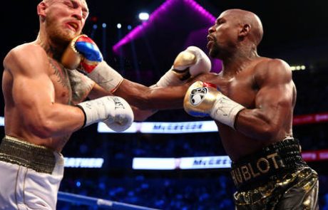 Mayweather v deseti rundi po tehničnem knockoutu do zmage proti McGregorju